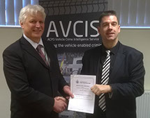 Car Trackers Navcis Head of Unit DCI Gordon Roberts Presents Automatrics National Police Partner Agreement to Automatrics MD Richard Taylor 